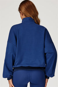 The Conquer Elevate Half-Zip Pullover